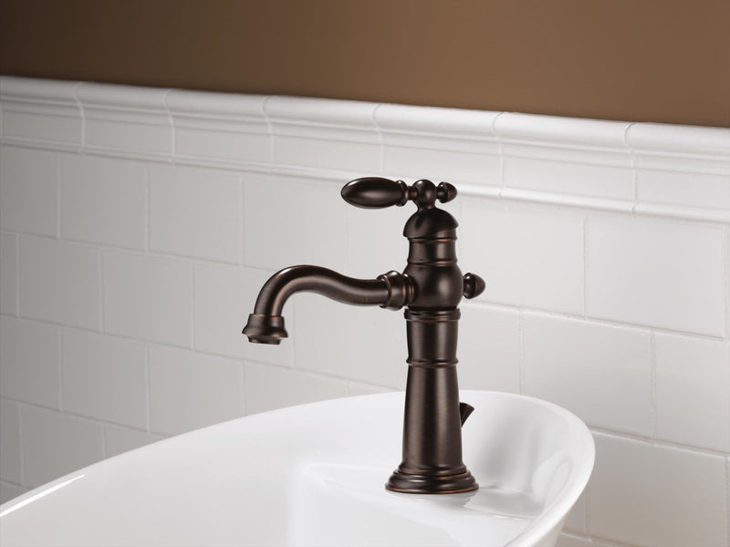 Delta Victorian Single Hole Bathroom Faucet with Pop-Up Drain Assembly - Venetian Bronze